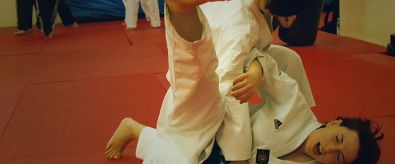 Dragon TaekwonDo students practising throws and self-defence on the mats